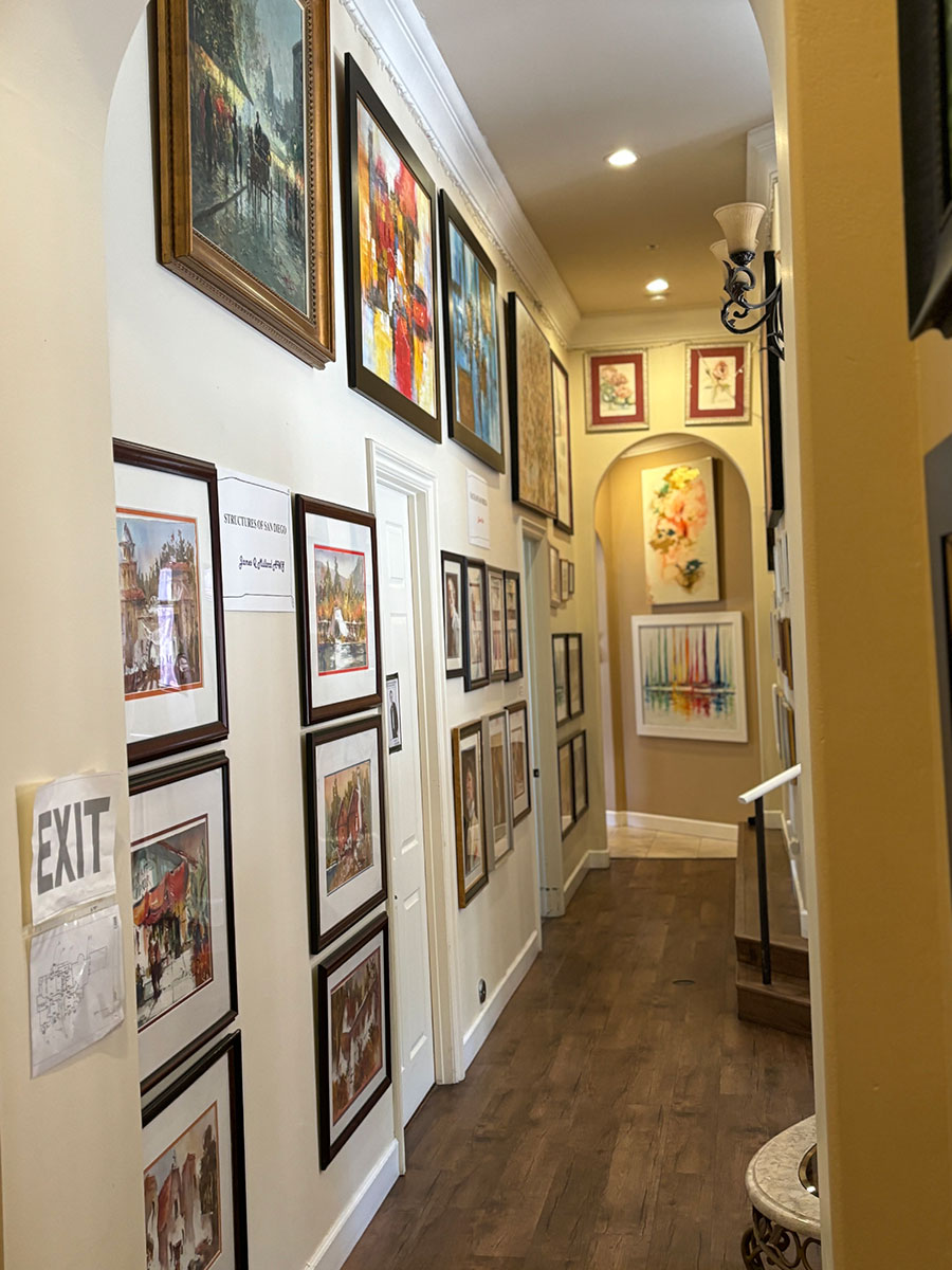 Hallway with artwork on the walls