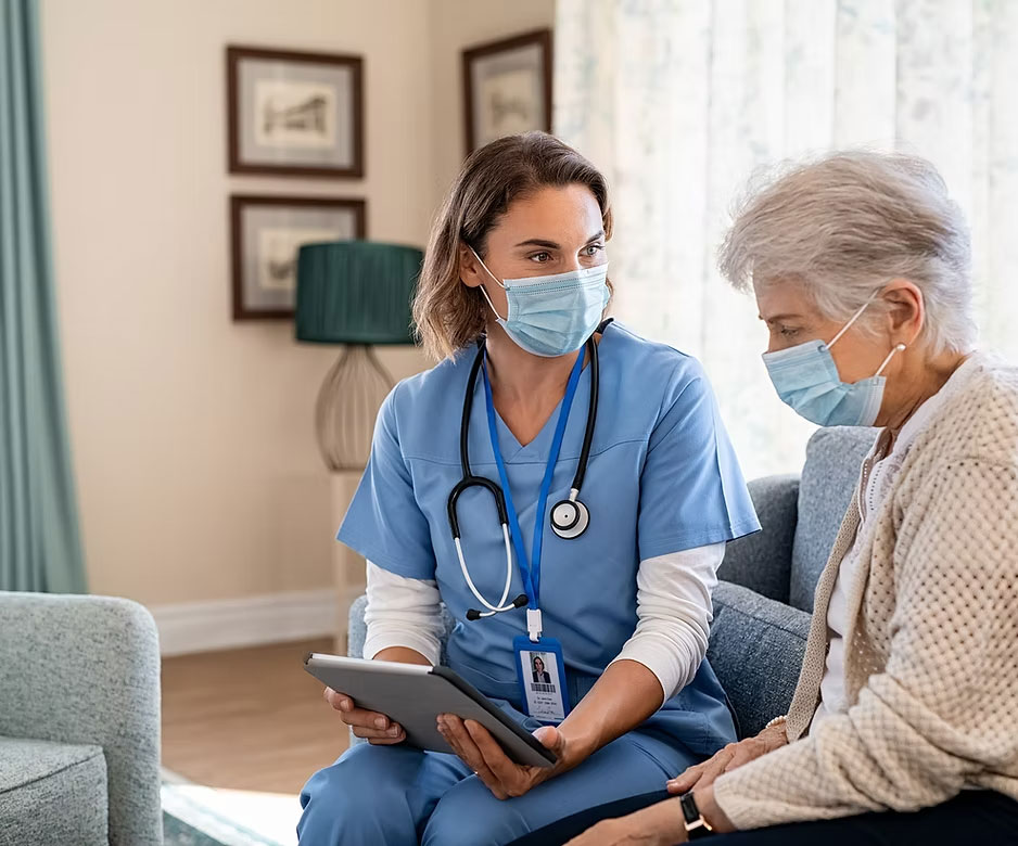 Nurse explaining medical information to resident