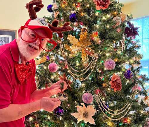 Philip decorating the Christmas Tree