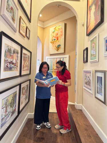 Staff consulting together about the care of patients